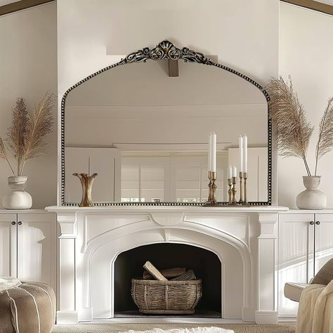 Vintage Mirror Above Fireplace, Antique Mirror Fireplace, Mantle With Arched Mirror, Large Mirror On Mantle, Above Mantel Wall Decor, Vintage Modern Fireplace Decor, Craftsman Mantle Decor, Ornate Fireplace Mantle, French Organic Modern Decor