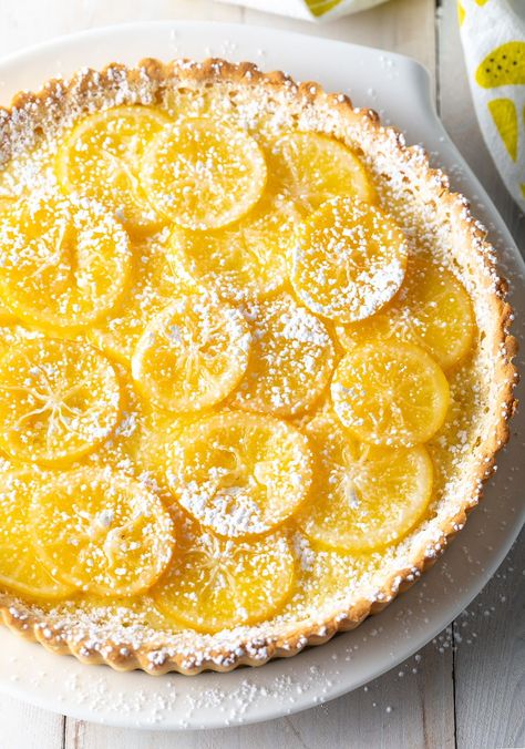 Meyer Lemon Tart Recipe #ASpicyPerspective #lemon #spring #tart #pie #easter #mothersday Spring Tart, Dessert Tarts, Meyer Lemon Recipes, Baking Weights, Tart Pie, Strawberry Sweets, Lemon Tart Recipe, Pescetarian Recipes, A Spicy Perspective