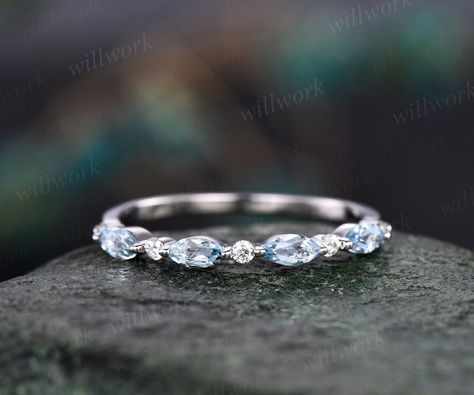 Handmade fine jewelry! The stones are round cut 1.5mm si-1 diamonds and 2x4mm marquise aquamarines. 925 Sterling Silver ring with 1.5mm moissanites. The material is solid 14k gold(white,yellow,rose gold is also available) Ring size can be choose from the selection box. Other matching band available: https://www.etsy.com/shop/willwork?section_id=20674906 This jewelry can also be made in solid 10k,14k,18k gold,with real diamonds.Contact me! Need rush order? contact me! Need custom making order? Co Platinum Wedding Rings For Women, Aquamarine Ring Band, Aquamarine Wedding Band, Aquamarine Wedding Ring, Aquamarine Wedding, Blue Wedding Band, Blue Aquamarine Ring, Wedding Ring Diamond, Stackable Rings Wedding