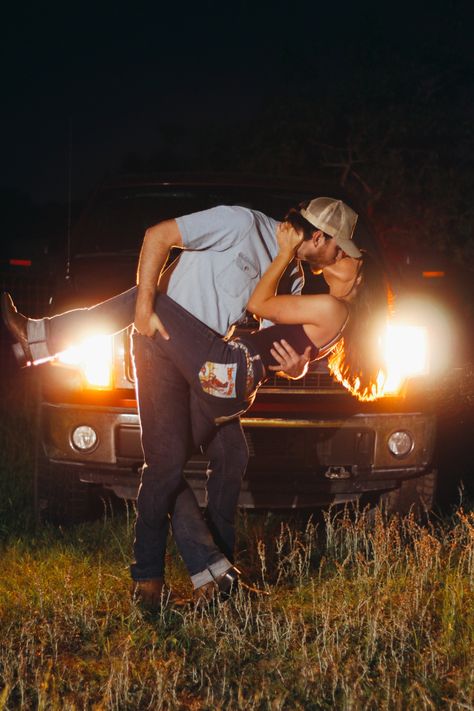 Country couple photo shoot idea -truck headlights photo shoot Truck Light Photoshoot, Headlight Couple Pictures, Wedding Photo With Truck, Matching Trucks Couples, Headlight Couples Photoshoot, Couple And Truck Photography, Couple Poses In Front Of Car, Headlights Couple Photoshoot, Sports Car Couple Photoshoot