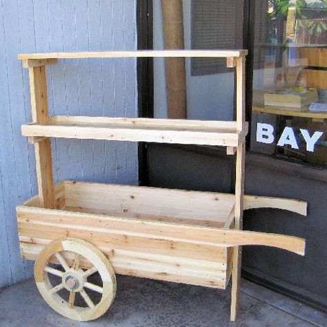 Very cool as a planter... need to make out of cedar or PTWood Wooden Vendor Cart, Wooden Cart On Wheels, Carts On Wheels, Cart Display, Flower Carts, Vegetable Stand, Wooden Cart, Pos Display, Flower Cart