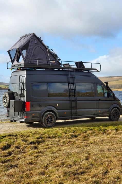 This is van life at its finest: MAN TGE 4x4 campervan, equipped with a bespoke roof rack, TentBox, external storage box, and built-in sun loungers on the roof deck.   This is 'The Lion', a custom van conversion build which sleeps and seats 5. The exterior is hot property, but the interior is as cool as a luxury ski chalet in The Alps.  If you dream of exploring in style and comfort, pin this as your ultimate camper van inspiration! Camper Van Roof Bed, Campervan For 4, Van Roof Ideas, Camper Van Roof Deck, Van Roof Deck, Campervan Exterior, Mini Van Camper, Ski Lodge Interior, Luxury Camper Van