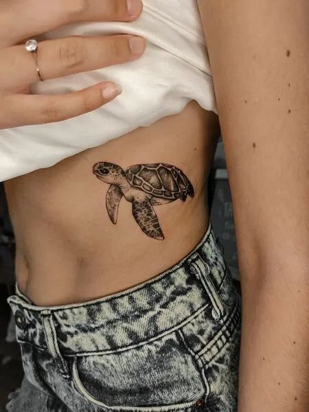 Turtle Rib Tattoo, Big Thigh Tattoos, Small Animal Tattoo Ideas, Small Animal Tattoo, Cute Turtle Tattoo, Small Turtle Tattoo, Small Tattoo Ideas For Men, Tortoise Tattoo, Crocodile Tattoo