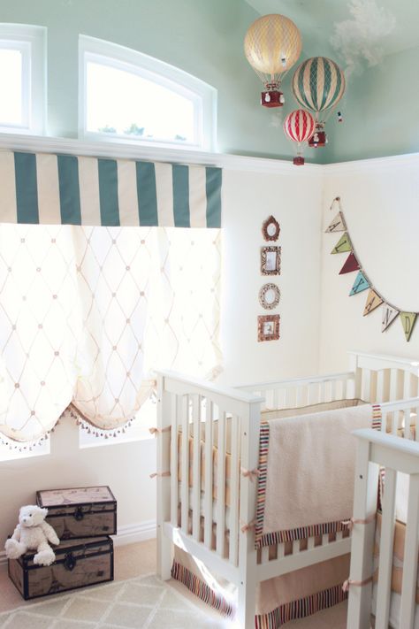 This vintage carnival-themed nursery is such a beautiful, serene space for twin girls! #sharedroom #nursery Vintage Carnaval, Carnival Nursery, Circus Nursery, Nursery Themes Neutral, Travel Nursery, Hot Air Balloon Nursery, Adorable Nursery, Neutral Room, Vintage Carnival