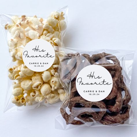 "Matching Dog Treat Favors:  https://www.etsy.com/listing/1494393259/customizable-dog-treat-wedding-favors?click_key=e024d846ba110989fcc1ddeab2b89b1a9d4bbd56%3A1494393259&click_sum=7c3cd685&ref=shop_home_recs_1&pro=1&sts=1 OR  https://www.etsy.com/listing/1508210439/customizable-dog-treat-wedding-favors Simple His & Her Favorites Wedding Favors CANDY IS NOT INCLUDED!!  Coming in quantities of 20, (10 His and 10 Hers) these clear self-sealing bags measure 4x6 inches with a 1.5 inch circle label.  They are self-sealing and come EMPTY ready for you to fill with your favor candy!  PRODUCT INFORMATION:  - Bags and Stickers are sold in quantities of 20. - Each circle sticker is 1.5\" comes beautifully printed with 'his favorite' AND 'her favorite' - Stickers and Bags will arrive unassembled so t Favorite Candy Wedding Favor, Wedding Favor Edible, Wedding Gifts For Guests Food, Wedding Favors His And Her Favorite, Wedding Favors Snacks, Candy Wedding Favours, His And Hers Snacks Wedding, Snack Favors Wedding, His And Her Fav Candy Wedding