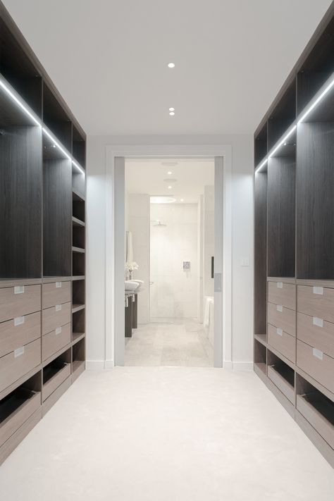 Dark wood walk in, walk through wardrobe to ensuite bathroom by Neatsmith with LED strip lighting. White and dark interiors.  #Monochrome #White #Dark #Wardrobe #Luxury #DressingRoom #MasterSuite #Ensuite #DreamWardrobe #Minimalist #Decor #Monochromedecor #Closet Walk Through Wardrobe To Ensuite, Walk Through Wardrobe, Ensuite Bathroom Designs, Mini Closet, Dark Wardrobe, Walk Through Closet, Dream Closet Design, Walk In Closet Design, Casa Country