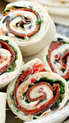 Italian Sub Sandwich Tortilla Pinwheels ~ These tasty tortilla roll-ups start with a cream cheese spread that’s loaded with garlic, onions, olives, cheese, peppers and Italian seasoning.. Amazing! Fingerfood Recipes, Italian Sub Sandwich, Tortilla Pinwheels, Mississippi Pot, Sub Sandwich, Cream Cheese Spread, Tortilla Rolls, Italian Sub, Italian Meats