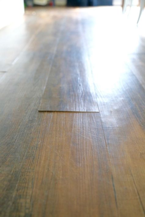 Can you believe that flooring is vinyl plank flooring? And that it cost under $2 per square foot? Here's a thorough review of Lowe's Style Selections luxury vinyl plank flooring, after living with it for more than 2 years Glue Down Vinyl Plank Flooring, Floating Vinyl Flooring, Best Vinyl Plank Flooring, Laminate Flooring Diy, Cheap Vinyl Flooring, Vinyl Wood Planks, Vinyl Wood Flooring, Kitchen Vinyl, Lvp Flooring