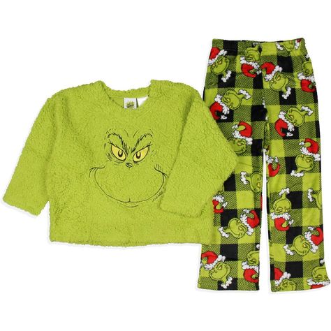 Get ready to steal the show this holiday season with this Officially Licensed pajama set. Whether you are a fan of Dr. Seuss' classic character or looking for cozy and festive PJs, this choice is perfect. This plush fleece set features a green top with an embroidered Grinch face on the front and black and green Santa plaid bottoms. Made with high-quality materials, this sleep set is designed for both comfort and durability. The soft fabric feels gentle against your skin, while the meticulous sti Christmas Pajamas Set, Grinch Apparel, Grinch Sweatpants, Preppy Christmas Wishlist, Grinch Merchandise, Green Christmas Pajamas, Grinch Pjs, Grinch Clothes, Kids Christmas Clothes