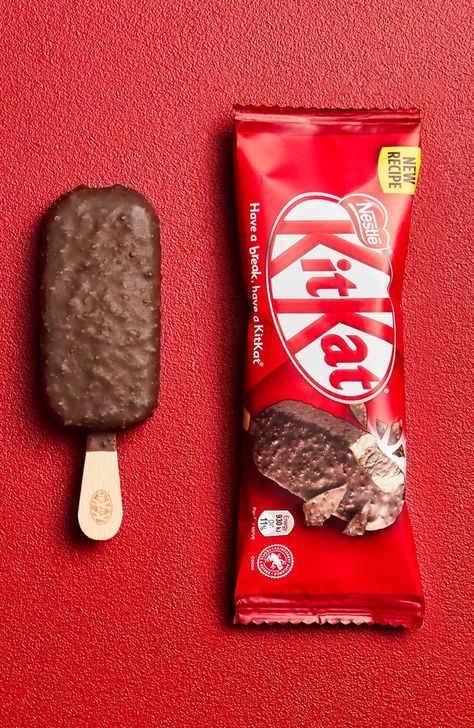 Just when you thought KitKat couldn’t get any better, this happens. The much-loved Aussie bar has been transformed into an ice cream after Peters and Nestle joined forces to put a new spin on the treat. While they were first launched in 2019, the sticks now feature a new recipe to really “reflect the inimitable taste experience” of the number one Aussie chocolate bar. Kitkat Ice Cream, Kit Kat Ice Cream, Nestle Chocolate, Ice Cream Sticks, Ice Cream Chocolate, Pantry Fridge, Ice Cream Stick, Junk Food Snacks, An Ice Cream