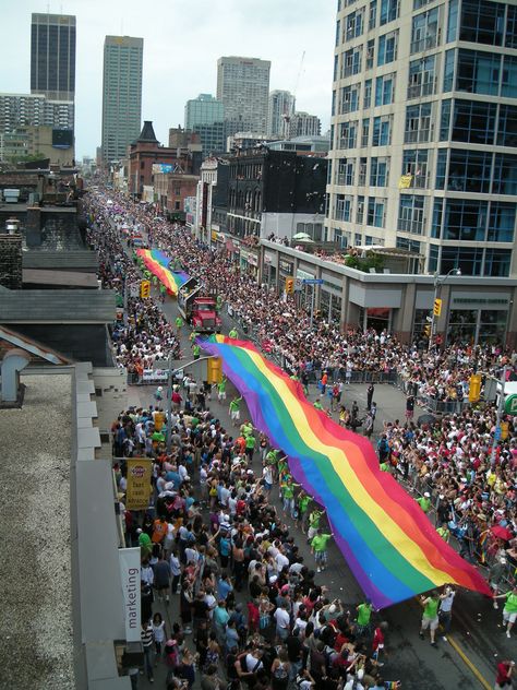 Toronto Pride Parade just south of Yonge and Wellesley, ph.  by Neal Jennings Sf Pride Parade, Toronto Pride, Lgbt Wallpaper, Gloria Gaynor, My Community, Mtv Movie Awards, Lost In Translation, Pride Parade, Seth Rollins