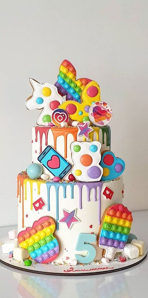 25. Two Tier Birthday Cake Topped with Fidget Toys for 5th Birthday When you start planning any party, you want to be creative—whether it... Fidget Birthday Cake, Popit Cake, Two Tier Birthday Cake, Tier Birthday Cake, Cake Designs For Girl, 9th Birthday Cake, Cake Design Ideas, 7th Birthday Cakes, 8th Birthday Cake