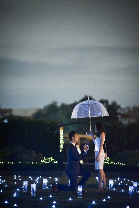 Most romantic proposal in the rain! #engagement #proposal #wedding #love #candles #romantic #tacori #taylorswift #domeumbrella Rain Proposal Ideas, Proposal In The Rain, Rain Proposal, Goa Photos, Heart Proposal, Cute Proposal Ideas, Candles Romantic, Morpheus Sandman, Dome Umbrella