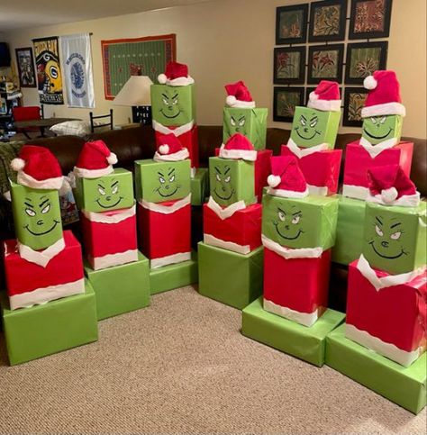 Cheap Diy Christmas Gifts Cricut, Gifts From Santa Wrapping Ideas, Diy Grinch Gift Ideas, Grinch Christmas Party Decorations Diy, Grinch Gift Tower, Grinch Presents Tower, Grinch Christmas Wrapping Ideas, Fun Christmas Wrapping Ideas For Kids, Grinch Gift Wrapping Ideas