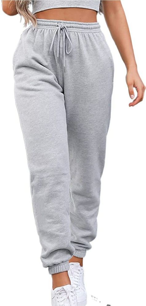 ღ Features: Fashion and simple active pants, yoga workout jogger pants for women and teen girls, solid color, elastic high waist design with drawstring, cinch bottom design can protect against wind and keep warm; with side pockets for mobile phones, keys and other small items, which is very convenient. Women's sports high waist jogging track pants, elastic cinch bottom sweatpants, loose fit sporty pants, elastic high waisted pants can better show off your long legs. Baggy Yoga Pants, Joggers Outfit Women, High Waisted Joggers, High Waisted Sweatpants, Cute Sweatpants, Hiking Pants Women, Sporty Pants, Winter Workout, Joggers Outfit