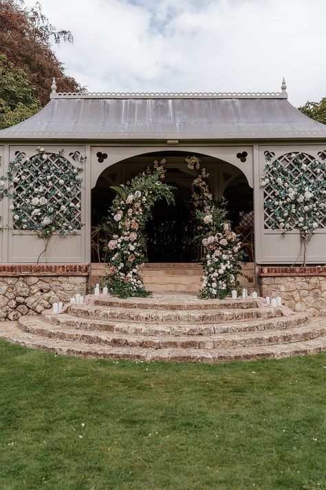 Pink wedding flower column altar decorations at Port Lympne wedding venue in Kent Port Lympne Wedding, Flower Arch For Wedding, Wedding Altar Decor, Flower Columns, Wedding Ceremony Altar, Port Lympne, Pink Wedding Flower, Arch For Wedding, Wedding Decor Outdoor