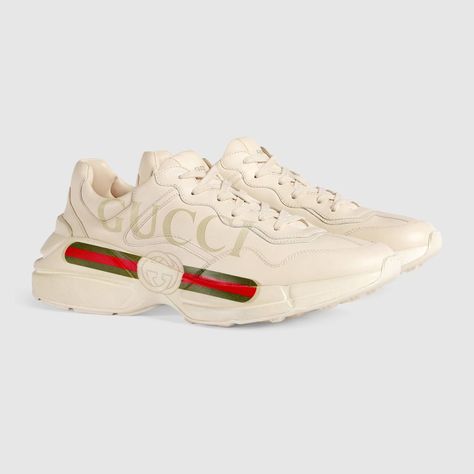 Shop the Rhyton Gucci logo leather sneaker by Gucci. Designed with a thick sole and bulky construction, the sneaker has a retro influence in leather with a vintage Gucci logo inspired by prints from the 1980s. Gucci Rhyton Sneakers, Tenis Gucci, Gucci Rhyton, Givenchy Jacket, Dad Shoe, Mens Sport Sneakers, Givenchy Tshirt, Louboutin Bags, Burberry T Shirt