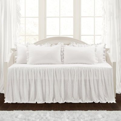 Your bedroom is your safe haven - don't be afraid to make sure it reflects your taste! This Standard 100 by OEKO-TEX® certified bedspread set adds an infusion of feminine charm to your master suite, guest bedroom, or daughter's room. It includes two shams (one for twin sizes), and a lightweight bedspread that pools to the floor, all crafted from polyester microfiber. The bedspread has a crinkled, ruffled design for a tastefully textured look, and the shams are surrounded by ruffled edges for mat Daybed Bedding Sets, White Daybed, Farmhouse Bedding Sets, Daybed Sets, Daybed Cover Sets, Daybed Bedding, Daybed Covers, Lush Decor, Farmhouse Bedding