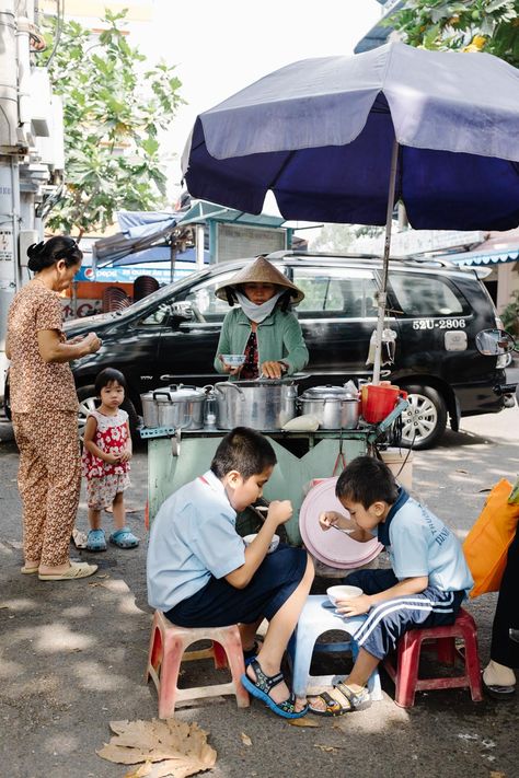 A Ho Chi Minh (Saigon) City Guide—In Ho Chi Minh City, Vietnam, we explore the vibrant food culture and the juxtaposition of old and new. Eating Reference, People In City, People In The City, Street Photography Portrait, Vibrant Food, City People, People Eating, Human Poses, Food Culture