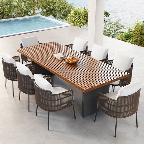 Bring an ideal addition to your outdoor space with this dining table. Featuring a natural and modern style, this dining table can easily bring a touch of glamour to outdoor places such as patio, garden, terrace, etc. Crafted from weather-resistant Teak wood, it is able to withstand numerous unexpected situations and remain durable.-Teak Construction:Teak is a durable, dense, coarse, grained hardwood. It contains high levels of resinous oils that make it naturally resistant to moisture, repellent Modern Outdoor Dining Sets, Pool Dining, Modern Outdoor Dining, Outdoor Patio Table, Esstisch Modern, Mesa Exterior, Teak Dining Table, Patio Dining Table, Patio Dining Chairs