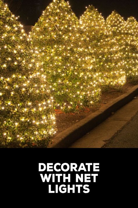 How to Decorate With Net Lights Ways To Use Net Christmas Lights, Christmas Net Lights Ideas, Net Lights Ideas Christmas Outdoor, Net Christmas Lights Ideas, How To Put Lights On Outdoor Tree, Net Lights Ideas Christmas, Net Lights Outdoor, Christmas Net Lights, Mesh Lighting