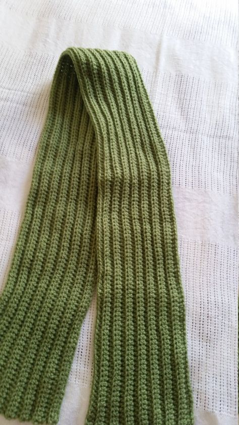 Crochet Scarf, Green Scarf, Winter Wear, Gift For Her, Gift Idea For Him, Unisex Scarf, Neck Warmer. Fairly long scarf that would keep your neck, and chest warm on early chilly nights/days and cold winters.Also could be used for teens, good way to protect your neck on chilly cold days. Will make a great gift for your loved one and someone special on up coming cold and chilly day's. I've used Red Heart yarn, which is warm yarn and will keep you and your loved once warm. Scarf Measures approximately: 49'' length by 4 3/4'' width. If you like this project you might like this in a different color: https://www.etsy.com/listing/552852929/crochet-scarf-yellow-scarf-winter-wear?ref=shop_home_active_1 https://www.etsy.com/listing/553188197/crochet-scarf-black-scarf-winter-wear?ref=shop_home_active_ Crochet Neck Warmer, Crochet Mignon, Yellow Scarf, Cute Scarfs, Scarf Neck, Crochet Winter, Green Scarf, Scarf Pattern, Long Scarf