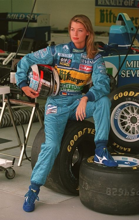 A MODEL POSES IN THE RACING OVERALLS OF REIGNING WORLD CHAMPION MICHAEL SCHUMACHER OF GERMANY AT THE INTERLAGOS CIRCUIT PRIOR TO THE 1995 BRAZILIAN Female Racer Aesthetic, Braxton Berrios, Female Race Car Driver, Female Racers, Car Outfit, Weird Beauty, Women Drivers, Hot Halloween Outfits, Formula Uno