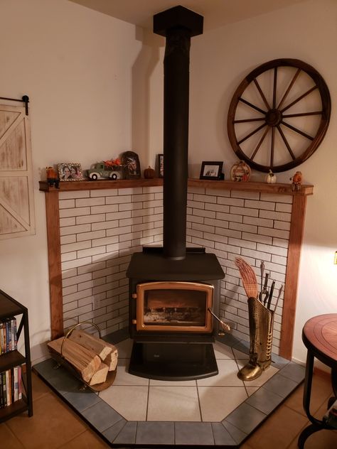 Brick Wall Behind Wood Stove, Tile Behind Wood Stove, Taupe Grout, Stove Ideas, Pot Belly Stove, Stove Backsplash, Wood Mantle, Wood Stove Fireplace, Wood Heater