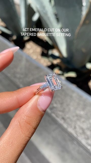 Golden String Inc on Instagram: "Want a Simple and Elegant setting, this one’s for you✨ This one of of my favorite settings for an Emerald cut! Emerald cut diamonds give that vintage but modern feel that pairs perfectly with tapered baguettes. A match made in Heaven😍 •4ct Emerald set on Tapered Baguette setting The rings on our feed are custom therefore aren’t listed on our website! Pricing varies depending on the quality of the center diamond. This ring is sold but the best way to order an Emerald With Tapered Baguettes, Emerald Cut Engagement Ring With Baggets, Emerald Cut Tapered Baguettes, Emerald Cut With Tapered Baguettes, Emerald With Baguettes, Emerald Cut With Baguettes, Engagement Ring With Baguettes, Emerald Set, Baguette Engagement Ring