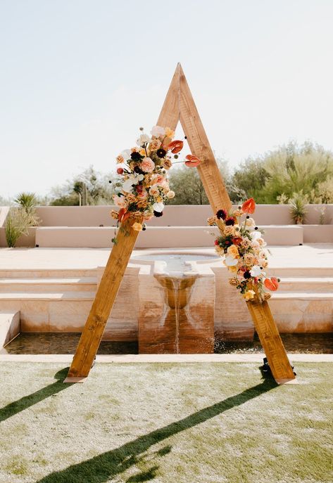 boho triangle arbor Destination Wedding Four Seasons Scottsdale Triangle Floral Arch, Fall Triangle Arch, Triangle Altar Wedding, Triangle Arbor With Flowers, Triangle Arbor Wedding, Triangle Arch Flowers, Wooden Triangle Arch, Triangle Wedding Arbor, Triangle Arch Wedding