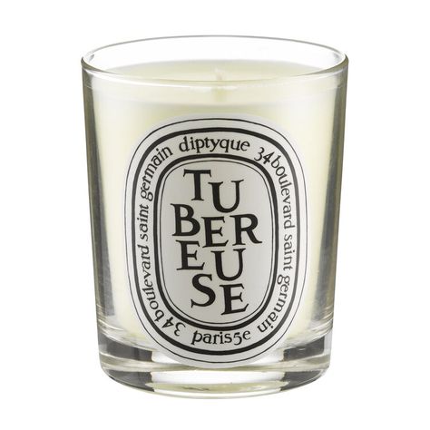 Surround yourself with the lush, sensual and generous scent of Tubereuse with a larger sized coloured candle in a beautiful tinted hand-blown glass jar. No flower is more beguiling or more prized. The most expensive floral perfume ingredient in the world, its heady and intoxicating fragrance is completely captivating, making it one of the most cherished scents of all time. From the legendary French perfume house of Diptyque, this luxurious handmade scented candle creates an elegant ambiance in Baies Candle, Beautiful Scented Candles, Diptyque Candles, French Perfume, Coloured Candles, Feminine Fragrance, Space Nk, Home Scents, Luxury Candles