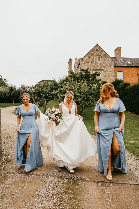 Bridesmaids in powder cornflower blue bridesmaid dress with butterfly sleeves and plunging neckline walking with bride in bow wedding dress with neutral wedding bouquet | bridal style | blue wedding theme | blue wedding fashion and outfits | Jessica Hopwood Photography Cornflower Blue Bridesmaid Dress, Wedding Theme Blue, Cornflower Blue Bridesmaid Dresses, Cornflower Dress, Neutral Wedding Bouquet, Cornflower Blue Wedding, Cornflower Blue Dress, Dress With Butterfly Sleeves, Blue Wedding Theme