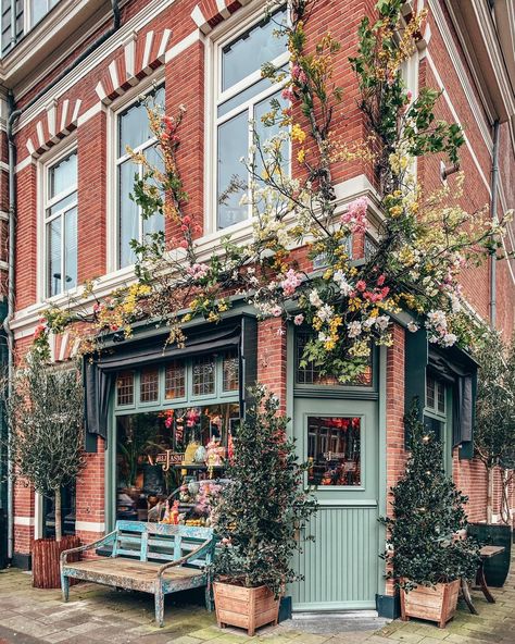 Jasmijn Bloembinders Haarlem @themorningstories fantastic floral shopfront @jasmijn_bloembinders and loving the vintage painted bench to rest a while - and don't forget to use our new hashtag #localshopfronts to share #shoplocal love #shopfront #flowershop #sharingtheworldsbestshops Painted Benches, Vintage Bakery, Victoria Magazine, Building Front, Coffee Shop Aesthetic, Retail Inspiration, Shop Fronts, Shop Front, Floral Shop