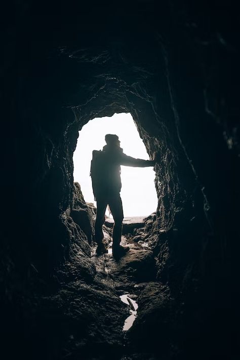 a man posing in a cave photo – Free Oregon Image on Unsplash Cave Photoshoot, Cave Pictures, Cave Photography, Poncho Blanket, Cave Photos, Man Posing, Body Guide, Cave Entrance, Dark Cave