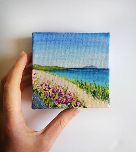 4x4 inch (10x10 cm) mini acrylic landscape of Scottish Beach Scene with pink floral detail.  Made in Scotland, UK.  This detailed original artwork is inspired by the beautiful landscapes of my home country, Scotland. Painted lovingly in acrylic on a mini 10x10 cm (4x4 inch) stretched box canvas, perfect to display in your living room, bedroom or hallway.  I will aim to post the painting within 1-3 business days. Delivery date will depend on destination location. ABOUT THE ARTIST: Hello! I'm Loui Scotland Art Painting, Mini Beach Paintings, 3x3 Canvas Paintings, Mini Canvas Landscape, Acrylic Beach Painting, Mini Acrylic Paintings, Art Mini Toile, Canvas Art Painting Abstract, Scottish Beach