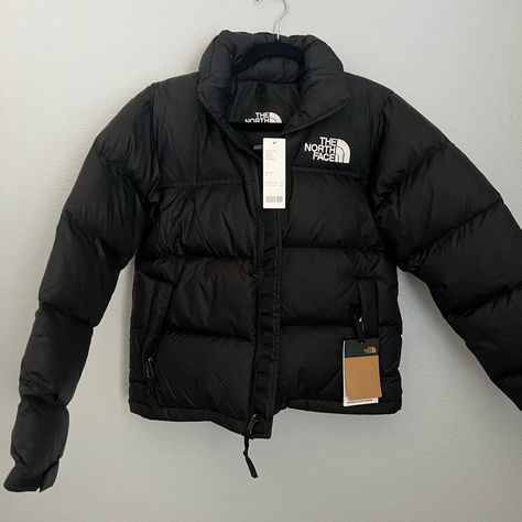 Brand New With Tags, The North Face Retro 1996 Nuptse Jacket In Black. Womens Size Small Stowable Hood Packs Into Collar Exposed, Vislon Center Front Zip Has The Oversize Logos Of The Original ’96 Jacket 700 Fill Goose Down Offers Warmth Yet Remains Extremely Compressible Dwr Finish Helps Keep You Dry 1996 North Face Puffer, Northface Jacket Outfit, North Face Puffer Jacket Woman, Northface Puffer Coat, Black North Face Puffer Jacket, Puffer Jacket Aesthetic, Black North Face Puffer, Nike Winter Jackets, 1996 Nuptse Jacket