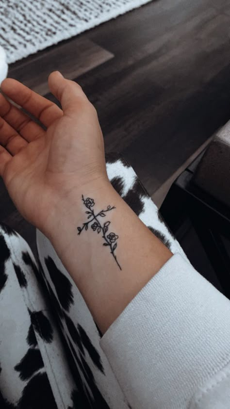 Small Cross And Flower Tattoo, Cross With Barbed Wire Tattoo, Tattoo Ideas Cross With Flowers, Cross Of Flowers Tattoo, Womens Cross Tattoo With Flowers, Flower With Faith Stem Tattoo, Small Cross Flower Tattoo, Tattoo Ideas Cross Flowers, Cross W Flowers Tattoo