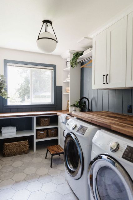 Before and After: Laundry Room Gets a Moody Blue Makeover Moody Blue Laundry Room, Office Laundry Room Combo, Laundry Room And Office Combo, Laundry Office Combo, Laundry Room Office Combo, Laundry Room Pantry Combo, Before And After Laundry Room, Transitional Laundry Room, Laundry Office