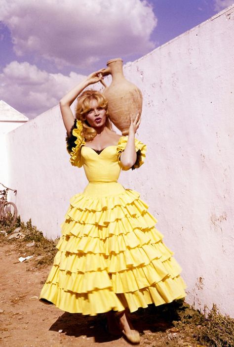 Brigitte Bardot style: a Spanish-inspired yellow dress from the '60s. Bridgette Bardot, Lee Radziwill, Spanish Dress, Bridget Bardot, Marianne Faithfull, Bardot Style, Gina Lollobrigida, Liza Minnelli, Movie Actress