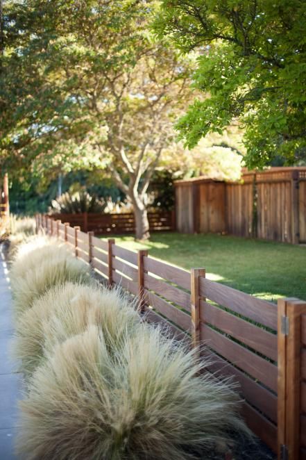 HGTV Magazine took a spin through neighborhoods all around the U.S. and found eye-catching houses worth a closer look. Gard Modern, Pagar Modern, Short Fence, Wood Fence Design, Hgtv Garden, Front Fence, Horizontal Fence, Fence Styles, Desain Lanskap