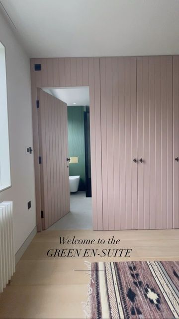 Built In Wardrobe Over Door, Wardrobe And Ensuite Ideas, Concealed Bathroom Door Wardrobe, Wardrobe With Door To Bathroom, Pink Built In Wardrobe, Hidden Closet Wall, Walk Through Wardrobe To Ensuite, Bedroom And Ensuite Ideas, Ensuite Dressing Room