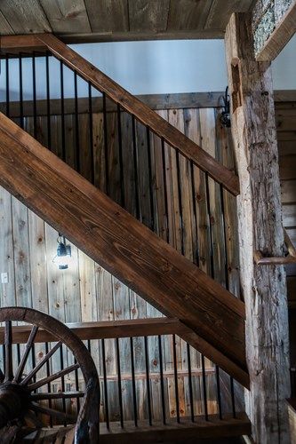 7 Rustic Railing Ideas | Northern Log Modern Cabin Stair Railing, Re Bar Stair Railing, Black Rebar Railing, Metal Railings Indoor, Rustic Railing, Cabin Stairs, Indoor Stair Railing, Wood Railings For Stairs, Farmhouse Staircase