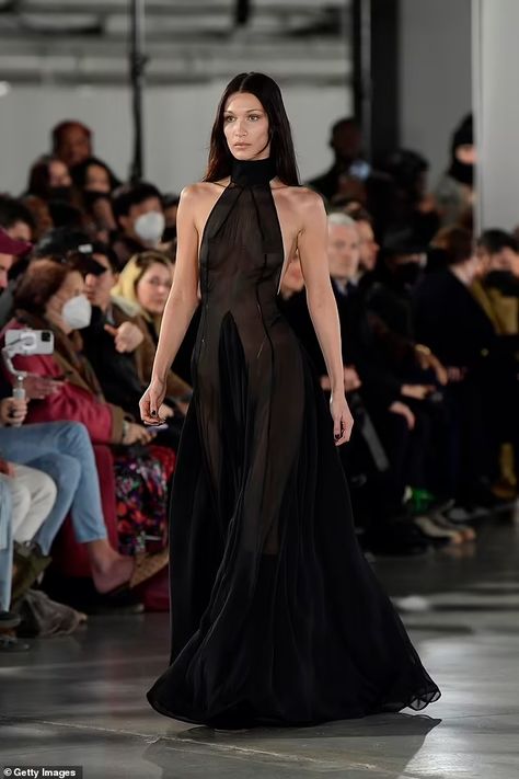 Bella Hadid goes braless in see through black dress during Paris Fashion Week  | Daily Mail Online Black Runway Dress, Black Dress Runway, Black Dress And Boots, Ludovic De Saint Sernin, Wife Clothes, Dress Paris, Black Sheer Dress, Bella Hadid Outfits, Runway Dresses