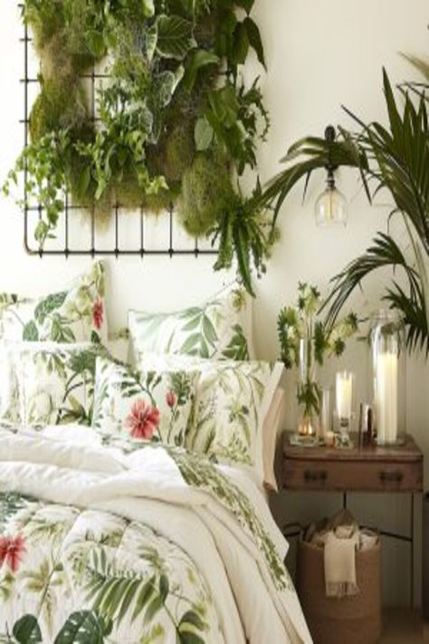 A guest bedroom with botanical-themed bedding, hanging green plants, and a vintage bedside table. Garden Theme Room, Guest Bedroom Ideas, Nature Inspired Decor, Versatile Furniture, Bedroom Idea, Open The Door, Garden Theme, Guest Bedrooms, Cozy Bed