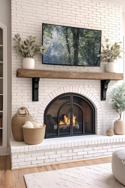 Cream Brick Fireplace Living Room, Home Interior Design Fireplace, Small Modern Fireplace Ideas, Fireplace Kitchen Living Room, Rustic Fireplace Hearth Ideas, Farmhouse Living Room Tv Wall With Fireplace, White Cobblestone Fireplace, Walls Next To Fireplace Ideas, Living Room Chimney Decor