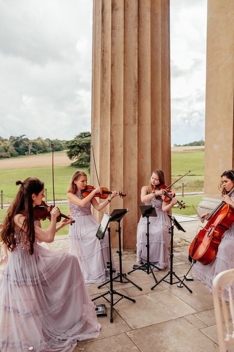 String quartet playing at wedding ceremony String Quartet Wedding, Metallic Wedding Theme, Metallic Bridesmaid Dresses, Bridgerton Wedding, Wedding Ceremony Outdoor, Flower Girl Outfits, Wedding Musicians, Ceremony Outdoor, Music Wedding