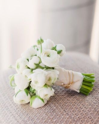 RANUNCULUS BOUQUET  The bridal bouquet consisted of white ranunculus and was finished with gold cord around the stems. Ranunculus Wedding, Bouquet Pastel, Ranunculus Bouquet, Fall Barn Wedding, White Ranunculus, Restaurant Wedding, Boracay, Martha Stewart Weddings, Bride Bouquets