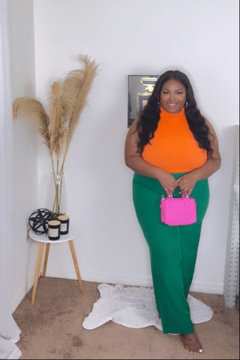 This trendy summer outfit is perfect for a girls night out or date night outfit. Color blocking is definitely in right now, and orange and green pairs perfectly together. Orange top, with green pants. This is definitely good for my plus size and curvy women. Color Blocking Plus Size, Plus Size Green Pants Outfit, Orange Plus Size Outfits, Green Color Blocking Outfits, Green Pants Outfit Summer, Orange Top Outfit Summer, Color Blocking Outfits Black Women, Top With Green Pants, Outfits With Green Pants