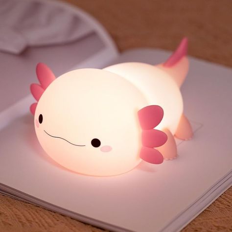 ✨ Looking for the perfect adorable night light for your little one's room? 🌙 Meet the Pink Axolotl Night Light – a soft silicone friend that brings a magical glow to any nursery or bedroom! 🌸 This rechargeable touch lamp is easy to use and adds a soothing ambiance, making it a must-have for toddlers and kids alike. 🦕 Whether it's a gift for a baby shower, birthday, or just because, this cuddly creature will bring smiles. 🎁💖 #NurseryDecor #AxolotlLove #GiftIdeasForGirls #SoftGlow Animal Lights, Animal Light, Cute Lamp, Monster Under The Bed, Cute Axolotl, Led Night Lamp, Kids Night, Light Eyes, Touch Lamp