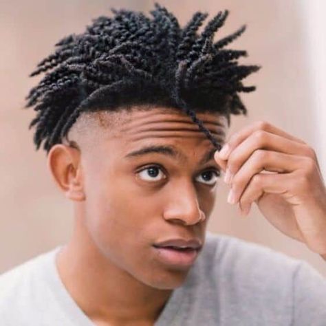 A black man wearing a twist out hair on top paired with a clean shaved low undercut Short Hair Twist Styles, Blonde Dreadlocks, Natural Hair Men, Braid Styles For Men, Short Twists, Dreadlock Hairstyles For Men, Black Men Haircuts, Twist Styles, Black Men Hairstyles